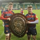 Toby Hunt and Callum Lodder hold the Lewis Shield aloft