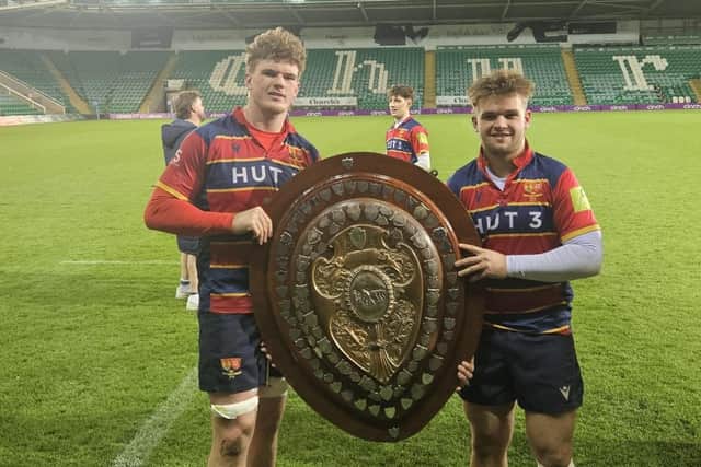 Toby Hunt and Callum Lodder hold the Lewis Shield aloft