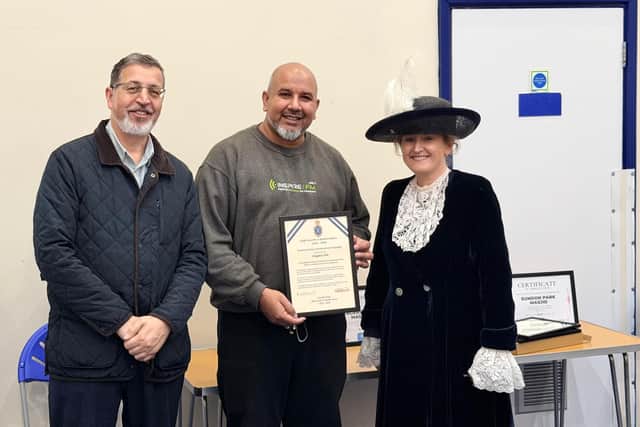 High Sheriff of Bedfordshire Camilla King presenting Inspire FM with an Outstanding Achievement Award.