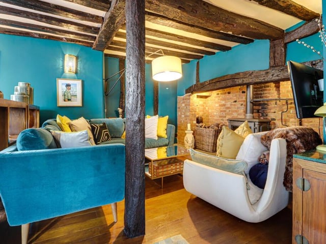 This room has a cosy little corner around the fireplace, ideal for those chilly evenings.
