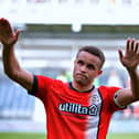 Luton striker Carlton Morris hails the Town supporters at the weekend - pic: Liam Smith