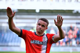 Luton striker Carlton Morris hails the Town supporters at the weekend - pic: Liam Smith