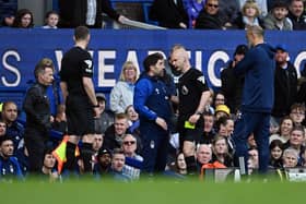 Anthony Taylor books Nottingham Forest assistant manager Rui Pedro Silva during the Reds' 2-0 defeat against Everton yesterday - pic: Gareth Copley/Getty Images