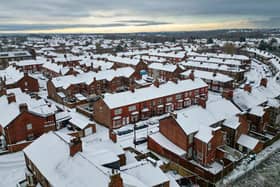 Homes are covered in snow in Cheshire. Photo by Christopher Furlong/Getty Images