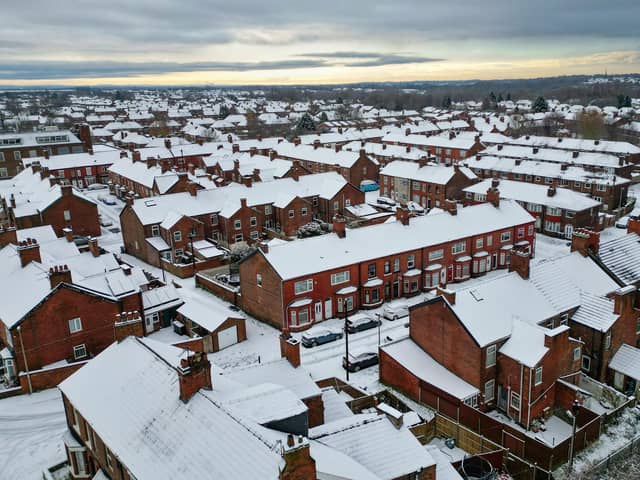 Homes are covered in snow in Cheshire. Photo by Christopher Furlong/Getty Images