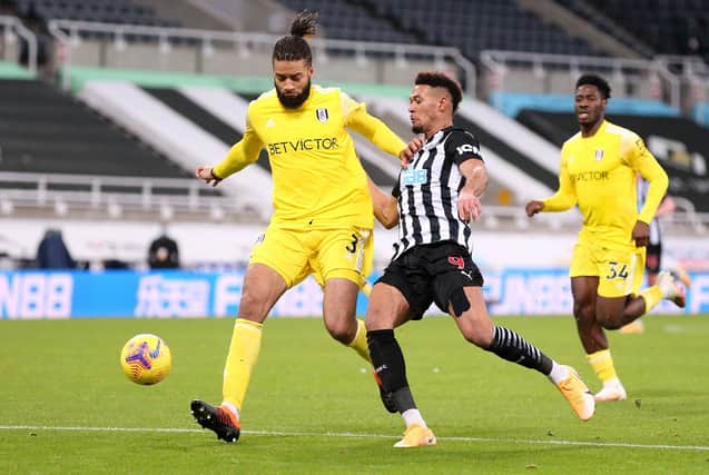 Michael Hector in action for Fulham against Newcastle in the Premier League