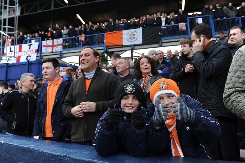 Young Luton Town supporters give a thumbs up before the start of the FA Cup with Budweiser Fifth Round Match between Luton Town and Millwall FC at Kenilworth Road on February 16, 2013.