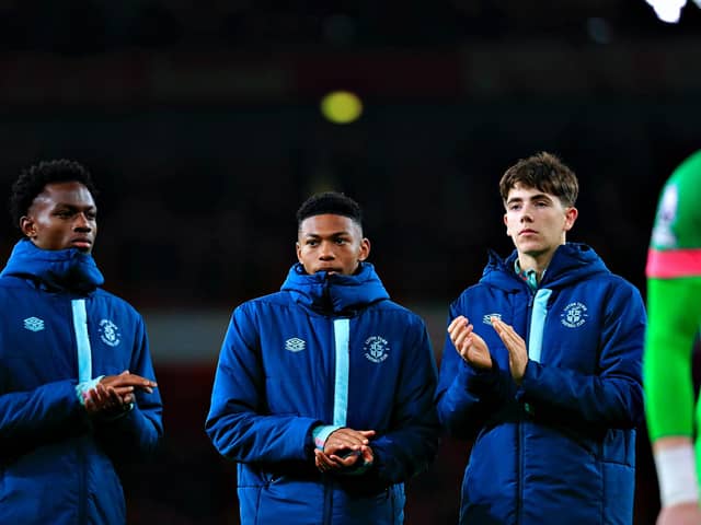 Christian Chigozie, Zack Nelson and Joe Johnson applaud the Luton fans at the Emirates Stadium - pic: Liam Smith