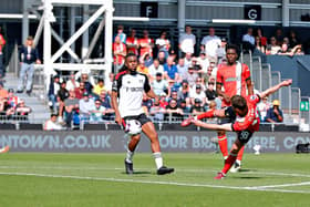 Jordan Clark saw this effort deflected away against Fulham - pic: Liam Smith