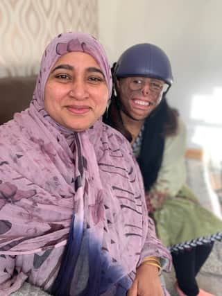 Luton burns survivor Shamiam Arif and her mum Tahira. Shamiam will speak at a charity dinner next month which is raising funds for the first ever burns centre in Kotli in Kashmir, where she was born