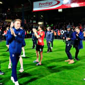 Cauley Woodrow applauds the Luton supporters after Town beat Sunderland 2-0