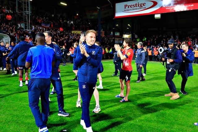 Cauley Woodrow applauds the Luton supporters after Town beat Sunderland 2-0