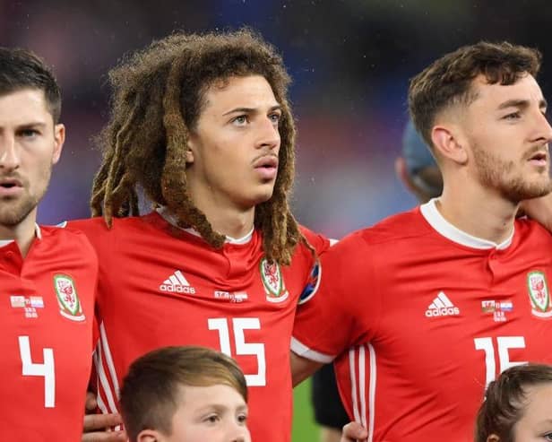 Tom Lockyer, right, sings the national anthem during Wales' UEFA Euro 2020 qualifier with Croatia in October 2019