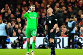 Town keeper Tim Krul in discussion with referee Anthony Taylor - pic: Liam Smith