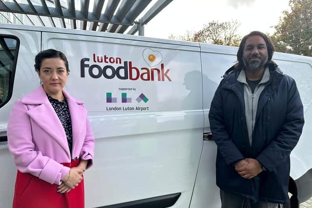 Sarah Owen MP and Amar from the food bank, at the Marsh Farm distribution centre. The MP launched the Here to Help campaign, on November 1.