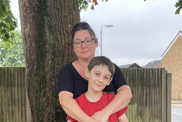 Maddie Roberts and her 10-year-old son Harleigh, who is now thriving in an educational provision that meets his needs.