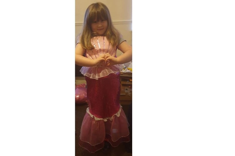 6-year-old Scarlett chose the adjectives 'sparkly' and 'nocturnal', so naturally she went dressed as a mermaid. Picture: Anna Stacey
