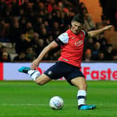 Former Luton defender Matty Pearson has signed for Doncaster Rovers