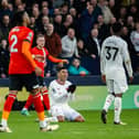 Casemiro sees yellow from referee David Coote during Manchester United's 2-1 win at Kenilworth Road - pic: Ash Donelon/Manchester United via Getty Images