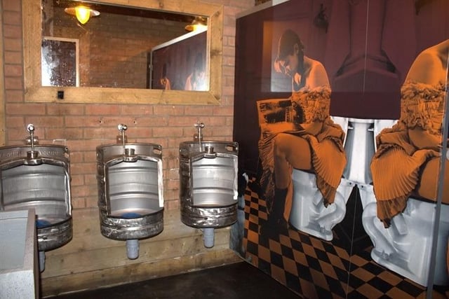 Of course, any bar has to have funky toilet décor, right?