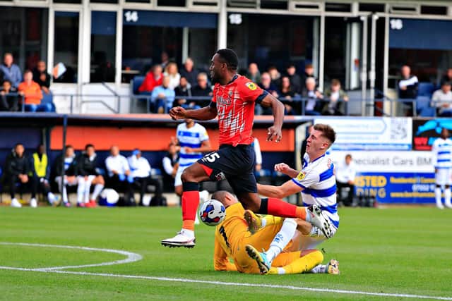 QPR defender Jimmy Dunne makes it 2-0 to Luton with this own goal at Kenilworth Road