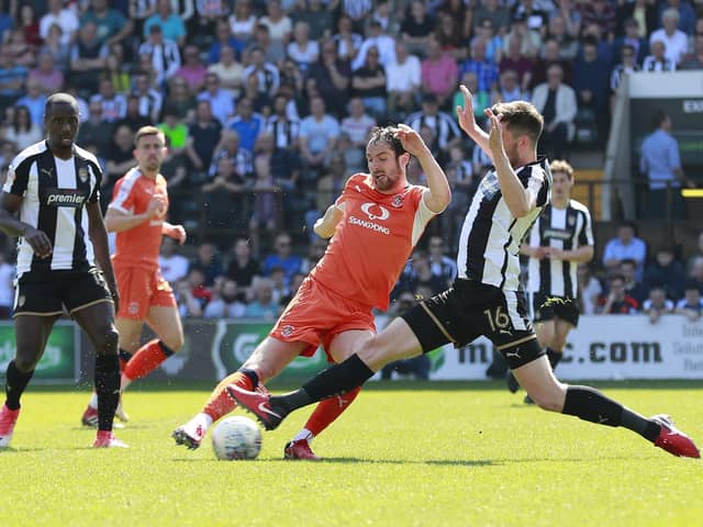 Danny Hylton on the ball at Notts County during Town's League Twin finale