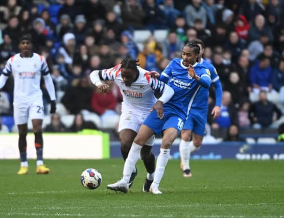 Town midfielder Pelly-Ruddock Mpanzu gets stuck in against Birmingham - pic: Gareth Owen