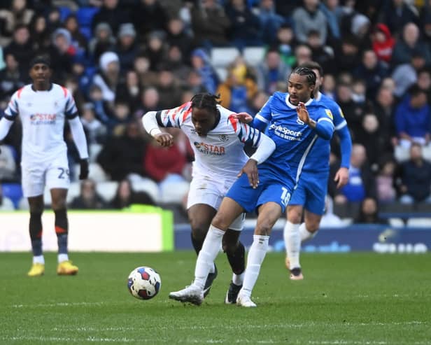 Town midfielder Pelly-Ruddock Mpanzu gets stuck in against Birmingham - pic: Gareth Owen