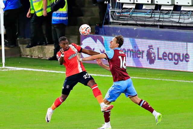 Amari'i Bell gets up to win a header against Burnley before having to come off injured - pic: Liam Smith