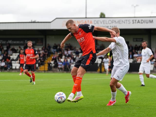 George Saville shields the ball against Boreham Wood on Saturday - pic: Andy Rowland / PRiME Media Images