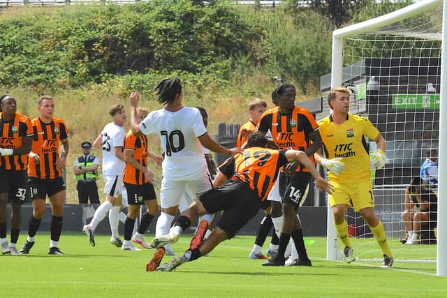 Jayden Luker bundles home Luton's second goal against Barnet this afternoon - pic: Andy Fitzsimons