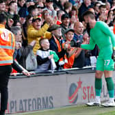 Matt Ingram fist bumps a Luton supporter after Town's 1-0 win over Reading