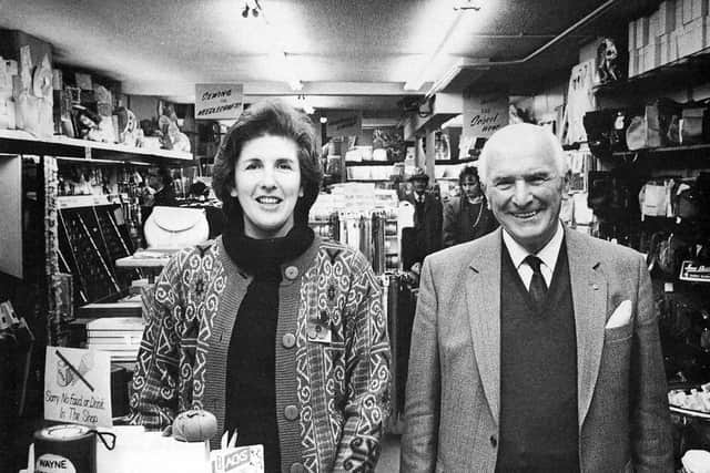 Pauline Keen and Fred Moore in their shop.