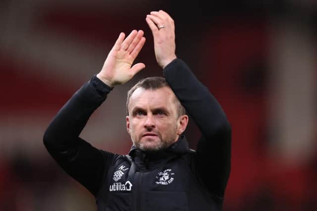 Hatters boss Nathan Jones applauds the Luton fans once last time on Tuesday night