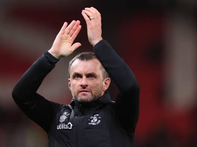Hatters boss Nathan Jones applauds the Luton fans once last time on Tuesday night