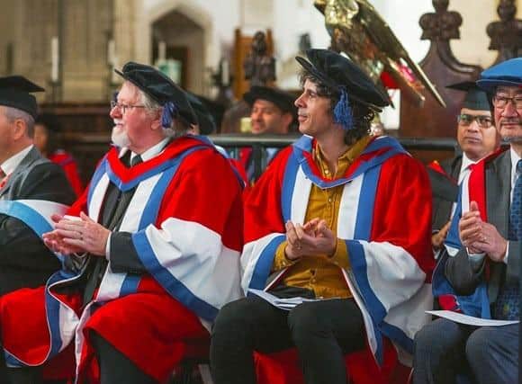 CBeebies star Andy Day, left, and Bedford education leader Mike Berrill were awarded Honorary degrees