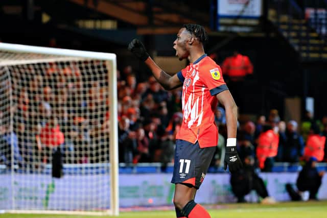 Elijah Adebayo celebrates his match-winner against Cardiff City