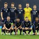 Jacob Brown lines up with the Scotland team ahead of their 3-3 draw with Norway on Sunday - pic: Ian MacNicol/Getty Images