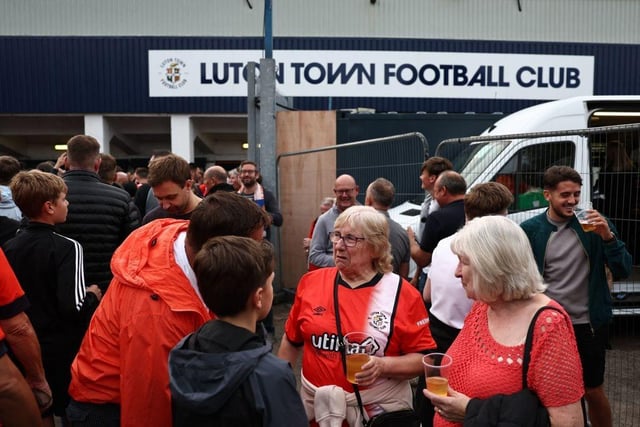 Luton followers congregate outside the stadium.