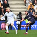 Jordan Clark looks to move the ball on against MK Dons - pic: Jane Russell