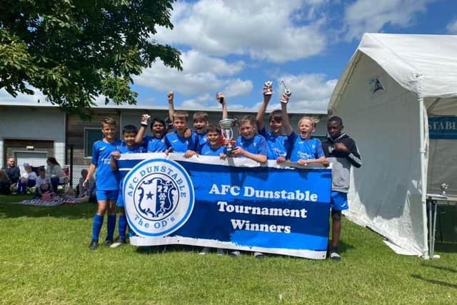 AFC Dunstable U12s lift the cup after beating Bedford Town Whites 1-0