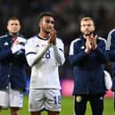 Jacob Brown applauds the Scotland fans after the 4-1 defeat against France on Tuesday night - pic: Mike Hewitt/Getty Images