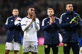 Jacob Brown applauds the Scotland fans after the 4-1 defeat against France on Tuesday night - pic: Mike Hewitt/Getty Images