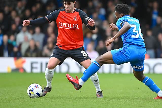Hatters midfielder Liam Walsh on the ball against Peterborough on Good Friday - pic: Andy Fitzsimons