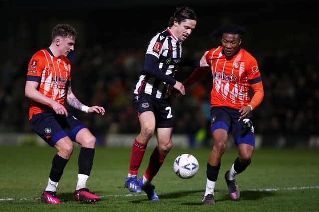 Luton were defeated 3-0 at Grimsby Town on Tuesday night