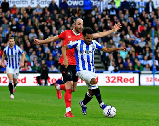 Danny Hylton chases back against Huddersfield on Monday night
