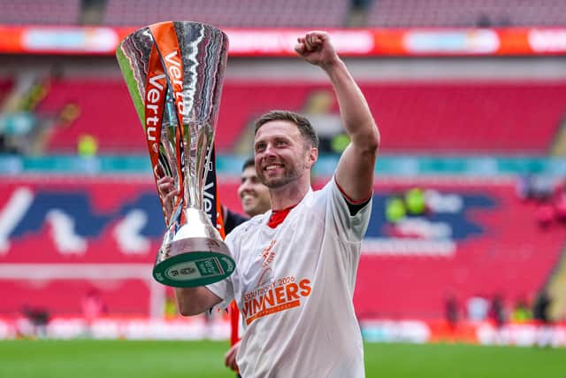 Jordan Clark celebrates winning the Vertu Trophy on Sunday - pic: David Horn / PRiME Media Images