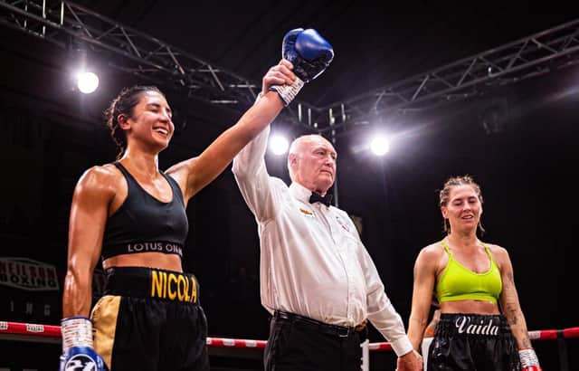 Nicola Barke has her arm raised after beating Vaida Masiokaite recently - pic: Neilson Boxing