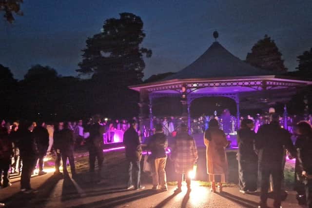 The bandstand was lit purple for the vigil. Picture: Luton Social Justice Unit