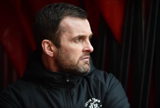 Nathan Jones, Manager of Luton Town looks on prior to the Sky Bet Championship match between Stoke City and Luton Town at Bet365 Stadium on February 20, 2021 in Stoke on Trent, England. (Photo by Nathan Stirk/Getty Images)